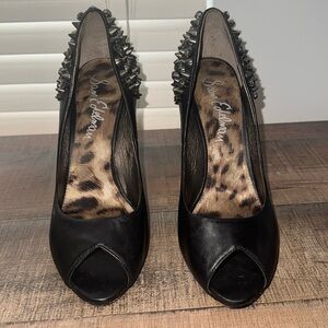 Sam Edelman spiked heels. Black with silver studs on heels. Opened toed.